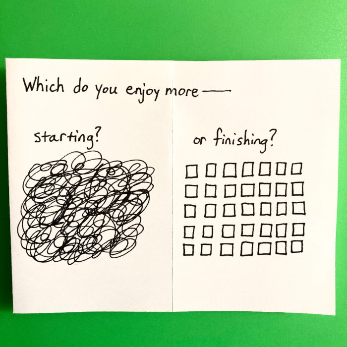 The first two pages of the zine. The text says "Which do you enjoy more--starting or finishing?" The zine is printed on white paper with black text and drawings. The drawing on the left page is a ball of scribbles. The drawing on the right page is neat rows of squares.The background of the photo is green.
