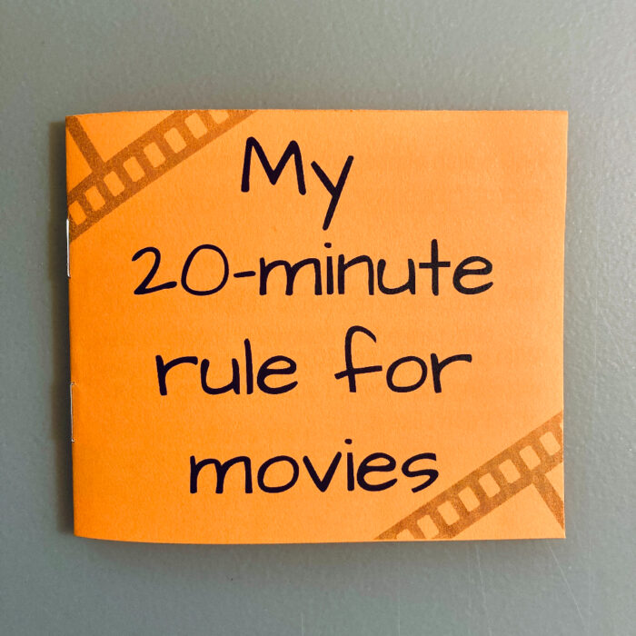 The cover of "My 20-minute rule for movies" zine. The text is printed in black on orange paper. Film strips are in the top-left and bottom-right corners of the cover.