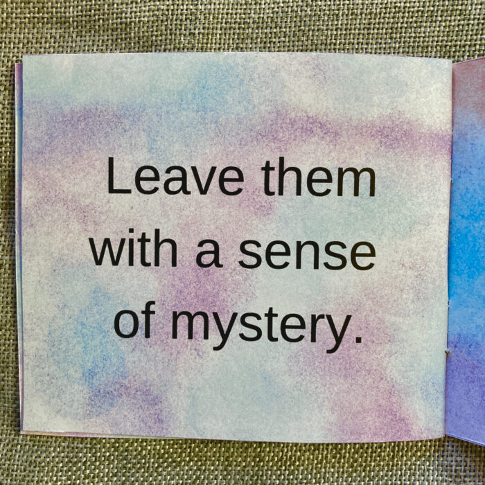 An interior page of "How to Deal with Small Talk." The background is a blend of blues and purples. The large, black font says, "Leave them with a sense of mystery."